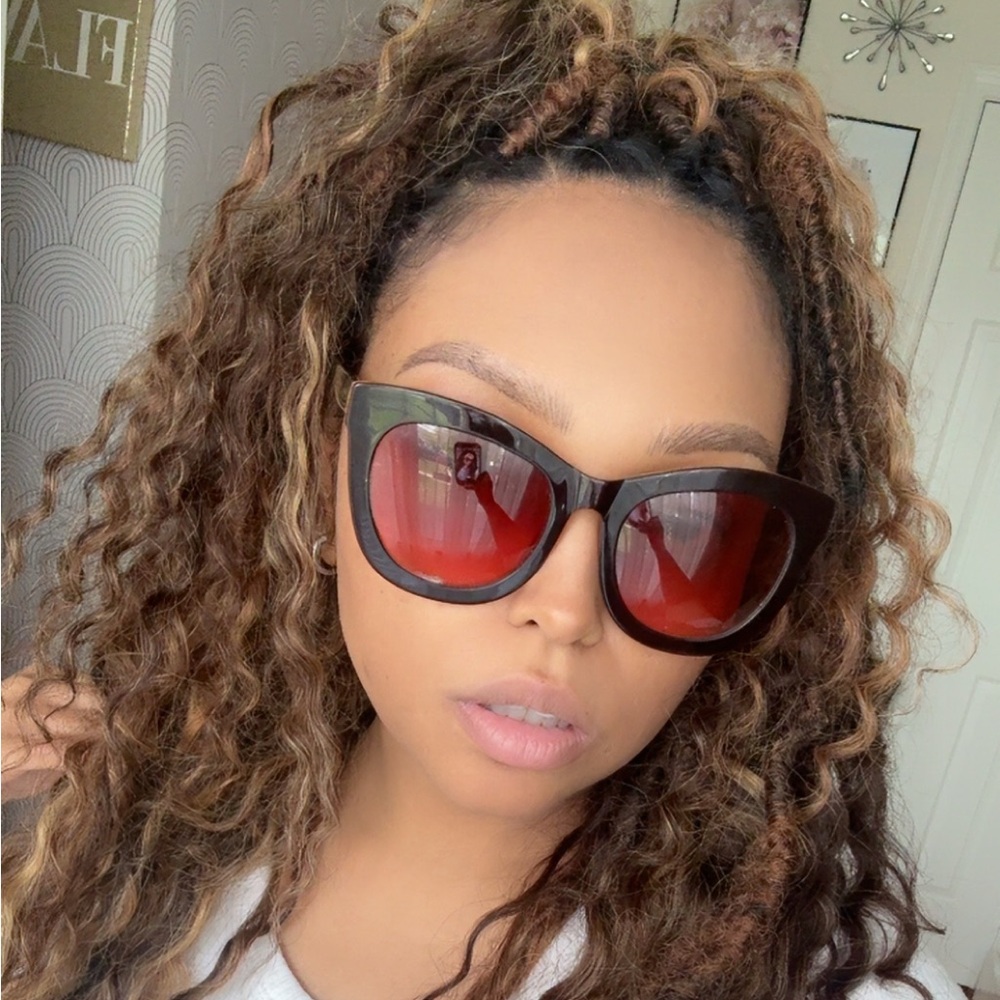 Black Sunglasses with Red Lenses by Cynthia Bailey